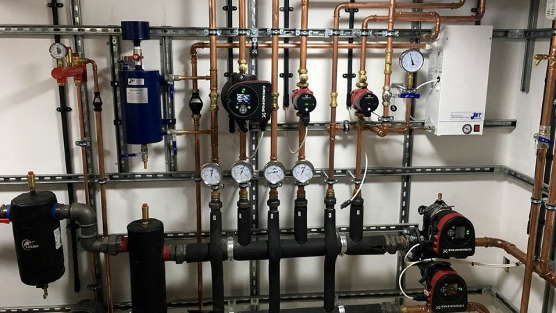 New basement plantroom heating installation of heating system for large Grade II listed house